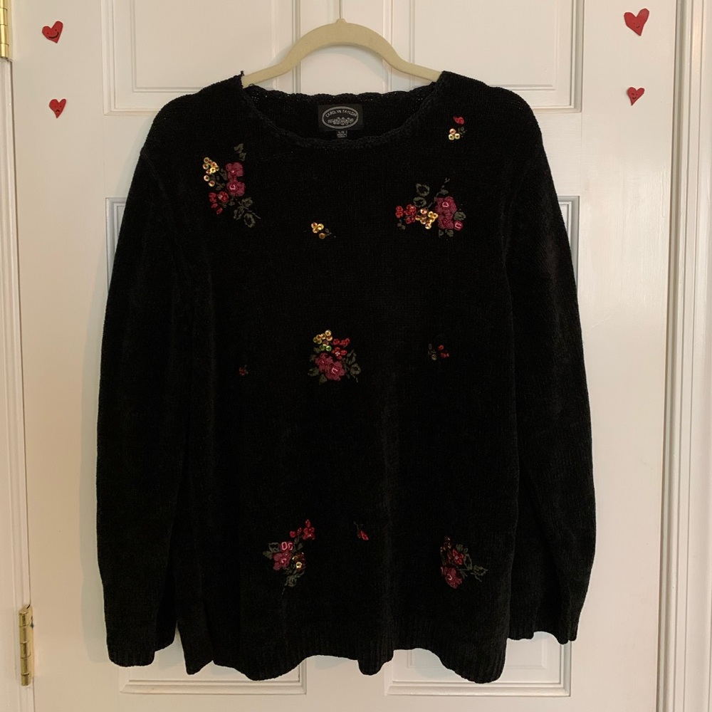 black knit sweater with pink flower embroidery/embellishments